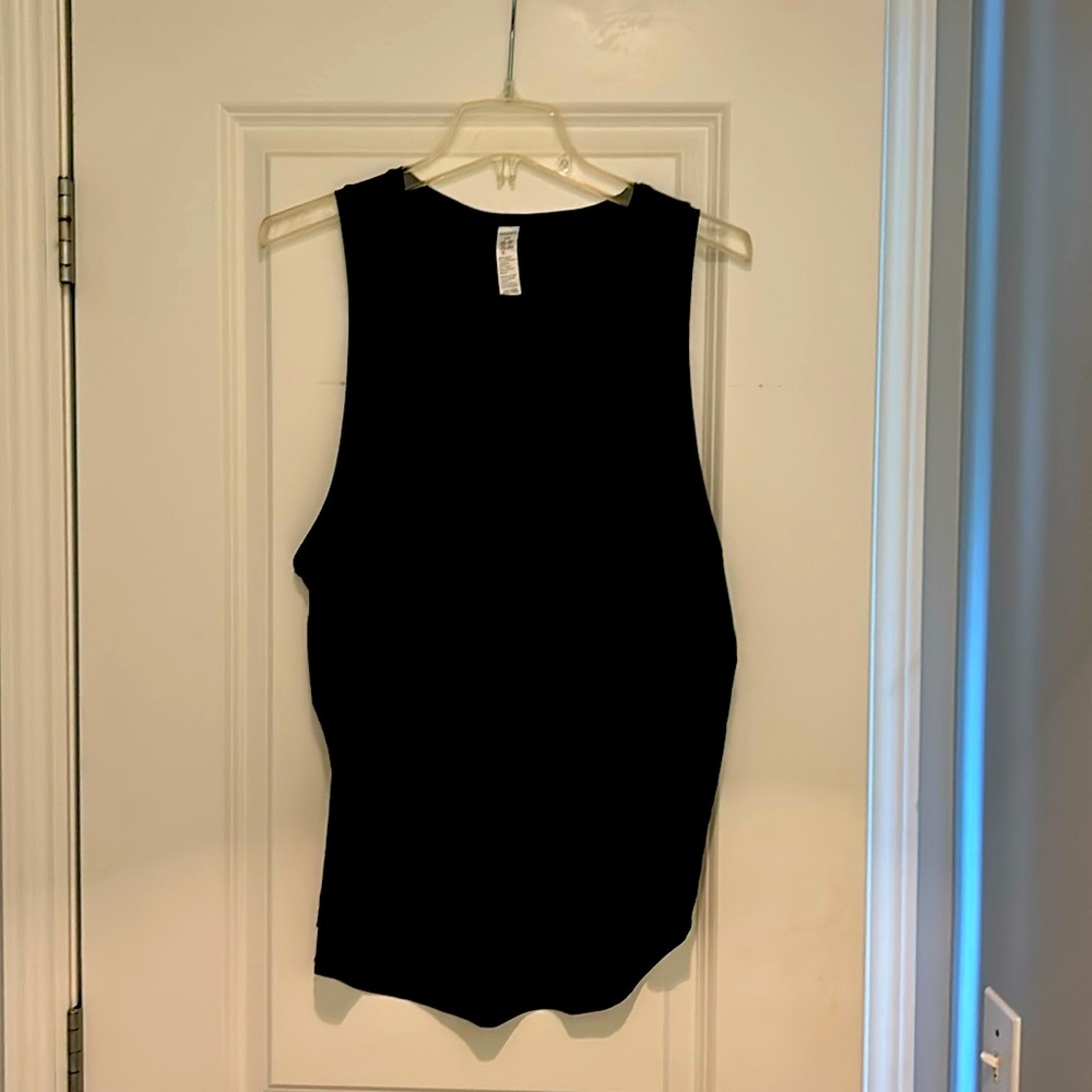 Women’s Spanx Activewear tank. Black. Size large. Pleated back, high low.